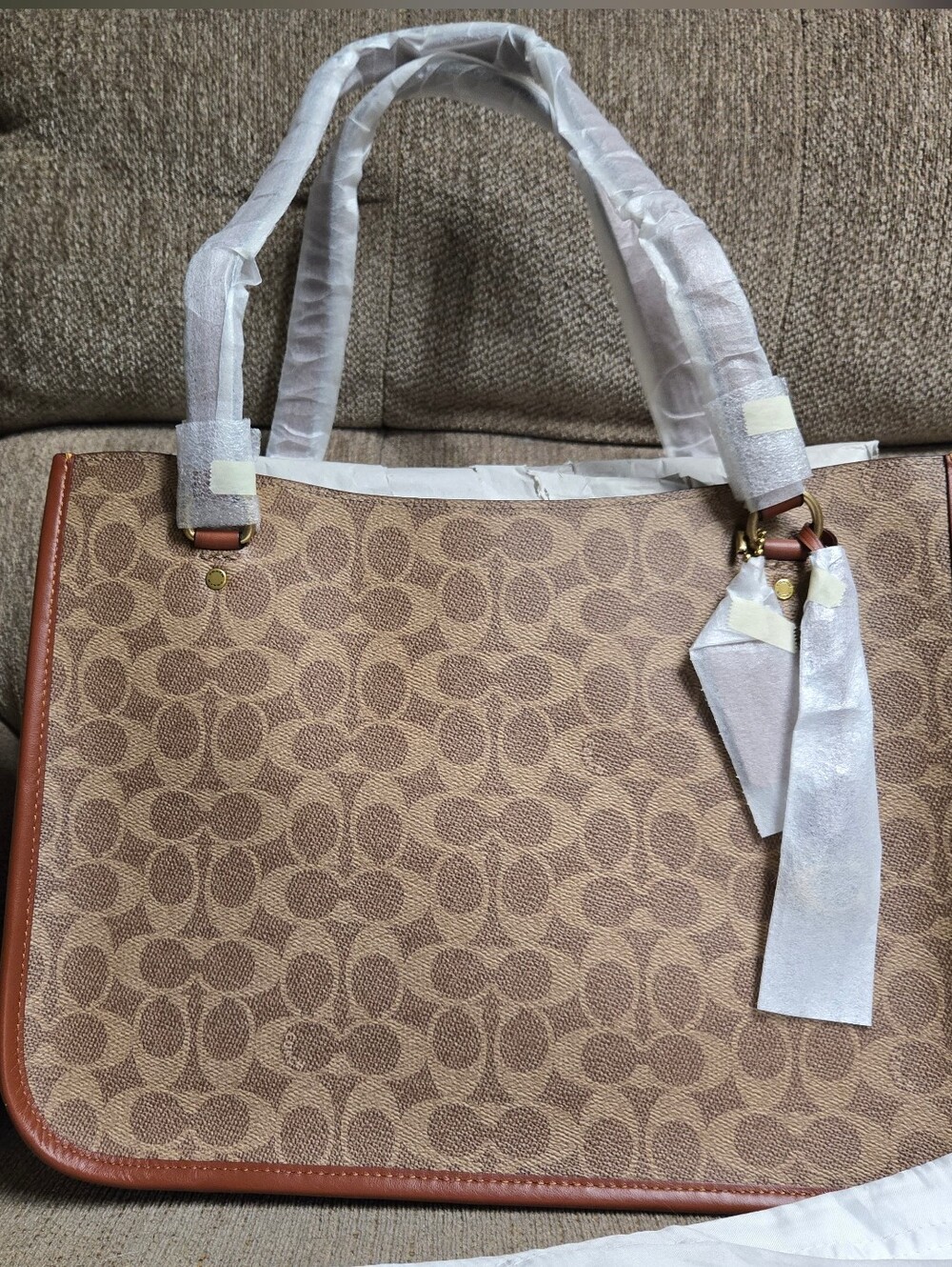 Brand New Coach Tyler Carryall. Signature
